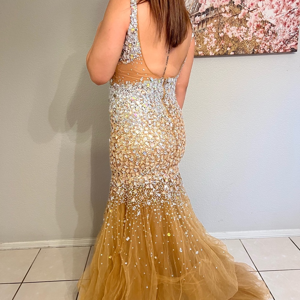 Worn only once for one event. No damages